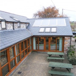 Country barn conversion and extension has number of green features.